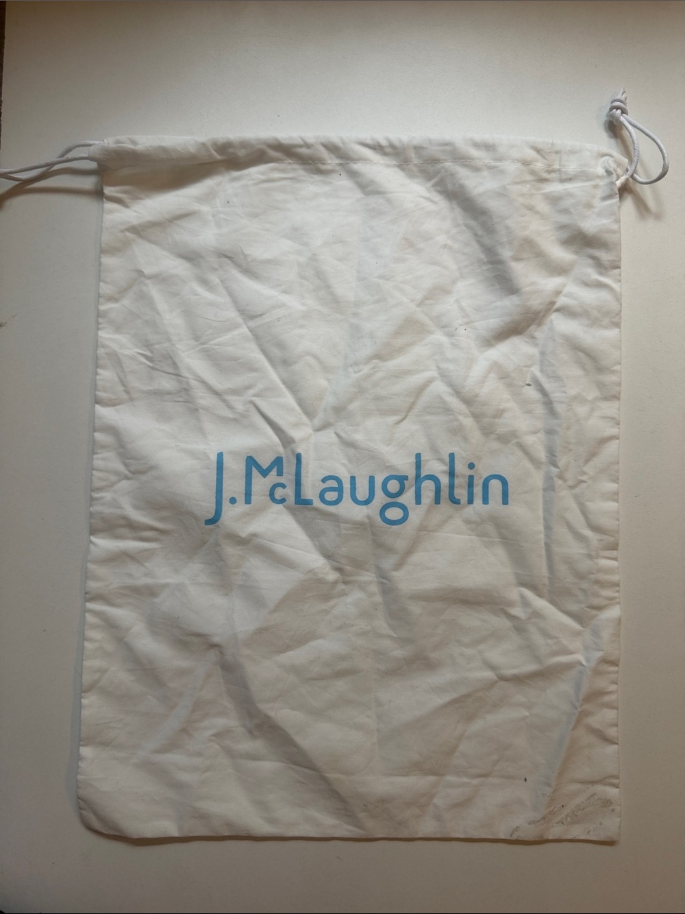 J. McLaughlin Cream Drawstring Dust Bag with Blue Logo